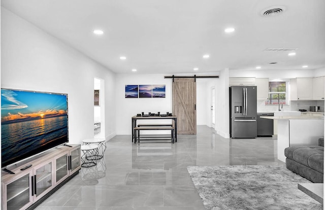 living room with a barn door