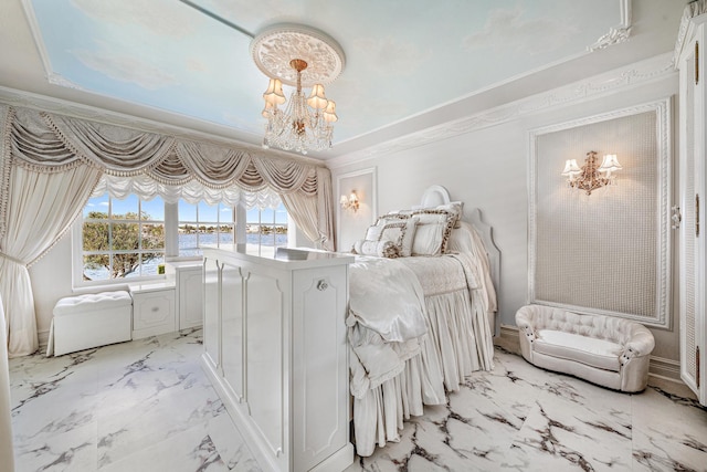 bedroom featuring ornamental molding and a chandelier