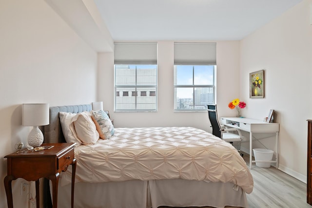 bedroom featuring light wood-type flooring