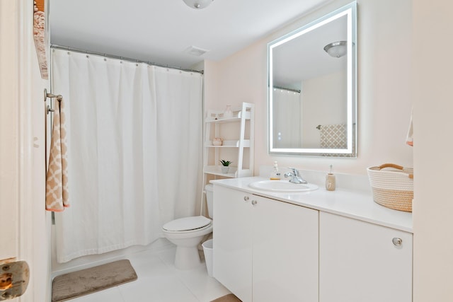 bathroom with toilet, a shower with shower curtain, tile patterned floors, and vanity