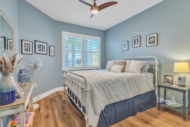 bedroom featuring ceiling fan and wood-type flooring