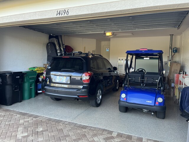 garage featuring a garage door opener