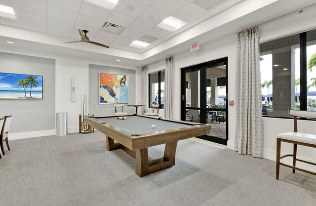 game room featuring ceiling fan, a wealth of natural light, light colored carpet, and billiards