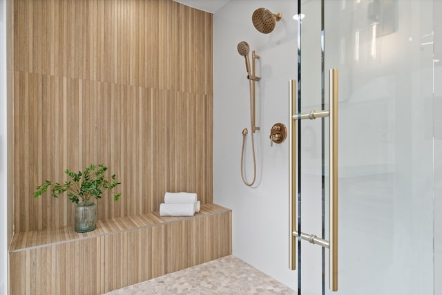 bathroom featuring an enclosed shower