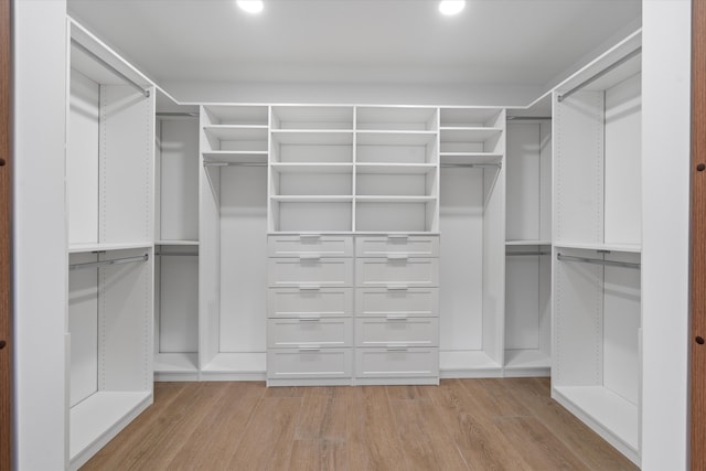 walk in closet featuring light wood-type flooring