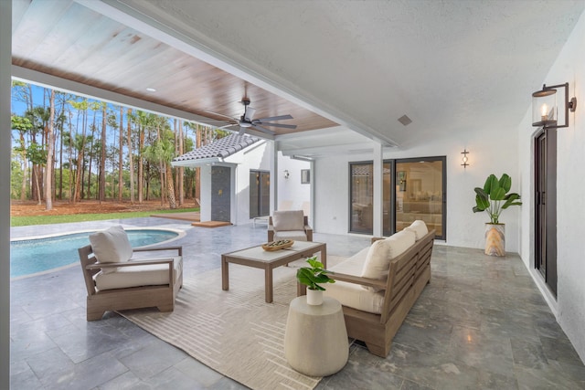 view of patio featuring ceiling fan and outdoor lounge area