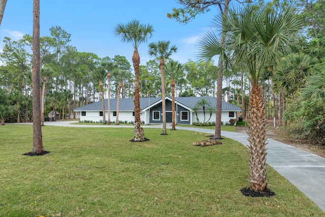 ranch-style home with a front yard