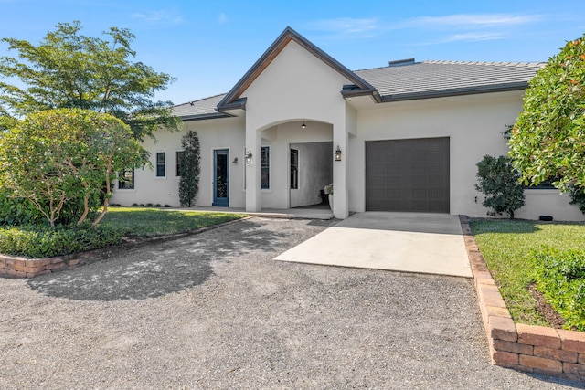 view of front of property featuring a garage