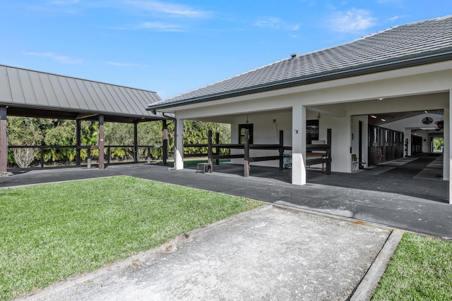 view of home's community with a lawn