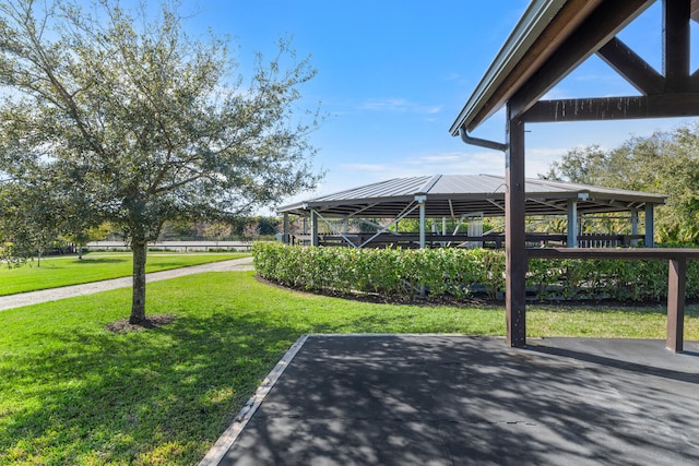 view of parking featuring a lawn