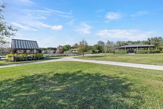 view of community featuring a gazebo and a lawn