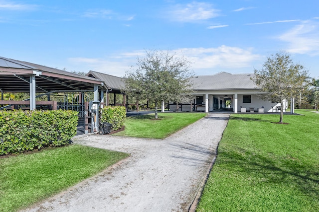 view of property's community with a yard