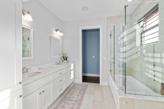 bathroom featuring vanity and separate shower and tub