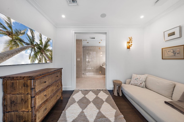 interior space featuring crown molding and dark wood-type flooring