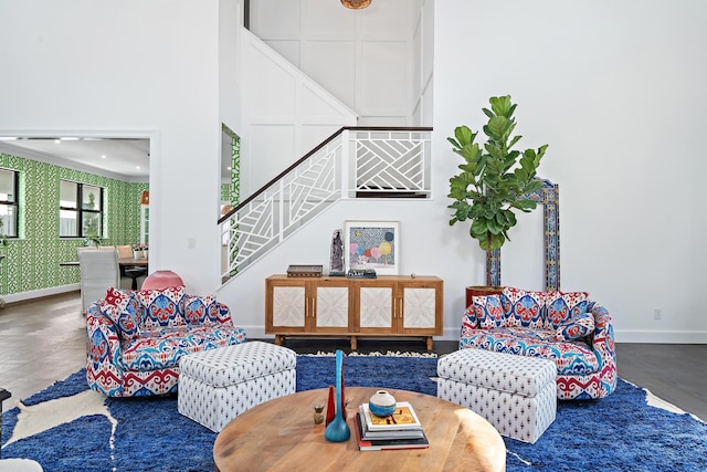 living room featuring a high ceiling