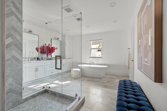 bathroom featuring vanity, tile patterned floors, and separate shower and tub