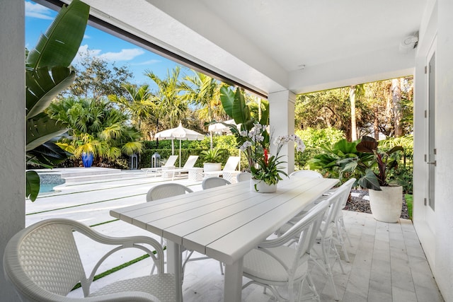 view of patio / terrace featuring a swimming pool