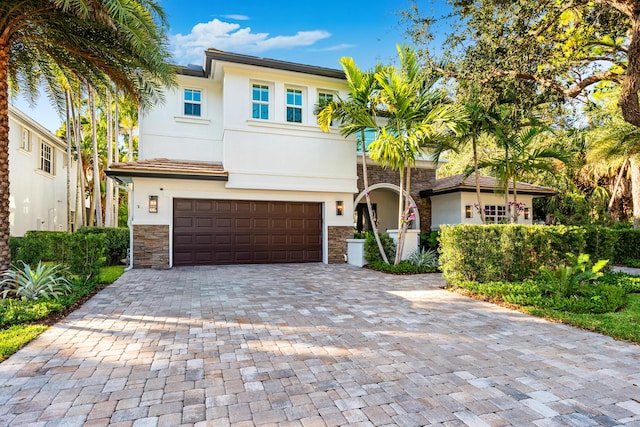 view of front of property with a garage