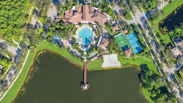 birds eye view of property with a water view