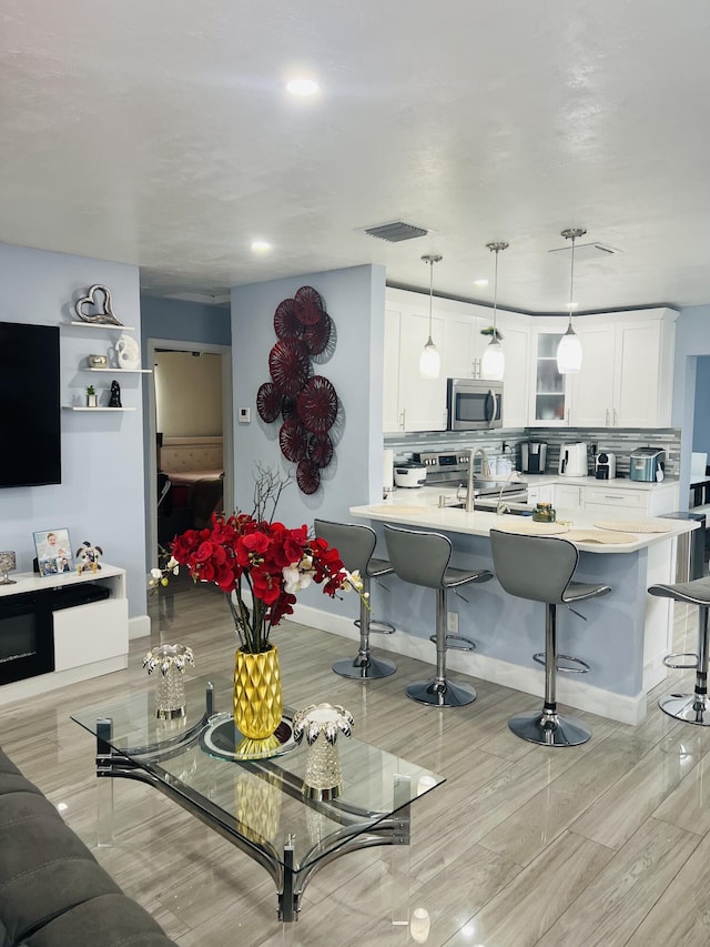 living room featuring sink