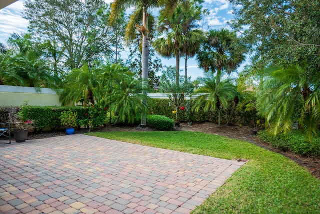 view of patio featuring fence