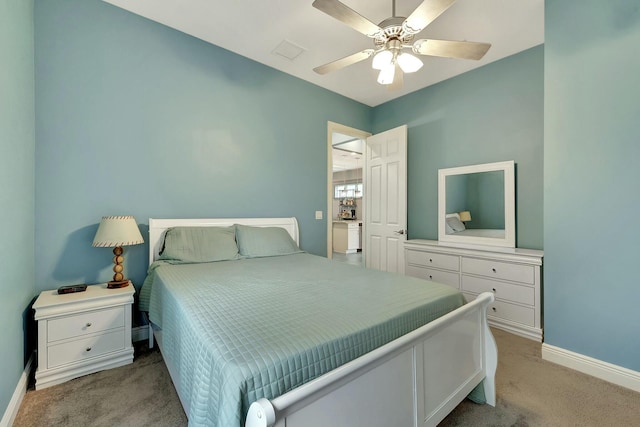 bedroom with ceiling fan and light colored carpet