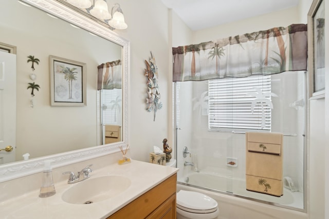 full bathroom with toilet, combined bath / shower with glass door, and vanity