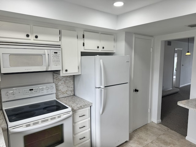 kitchen featuring white cabinetry, tasteful backsplash, white appliances, light colored carpet, and pendant lighting