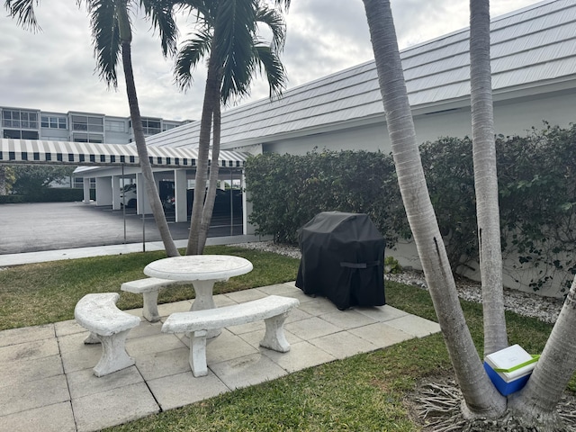 view of patio / terrace featuring a grill