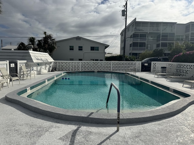 view of pool featuring a patio