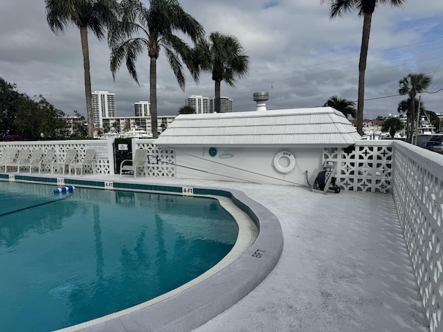 view of pool featuring a patio