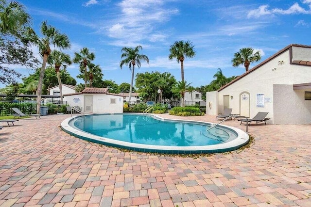 view of swimming pool featuring a patio