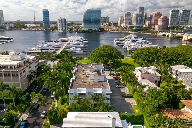 birds eye view of property featuring a water view