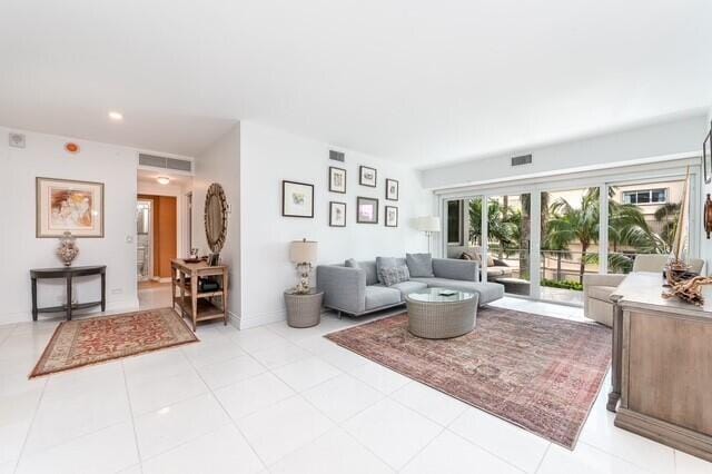 living room with light tile patterned floors