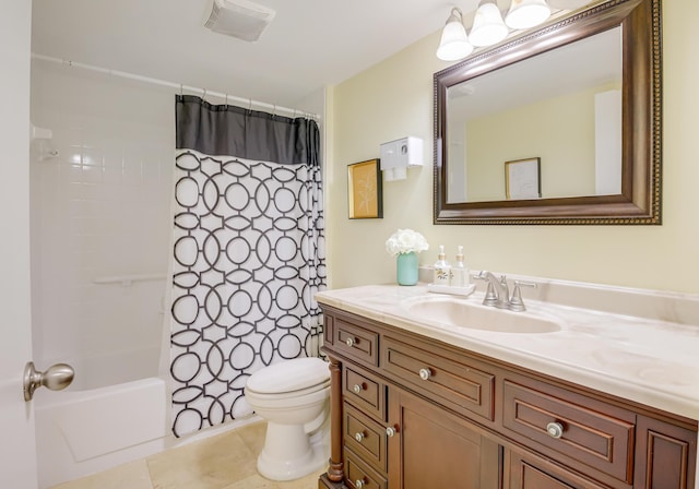 full bathroom with tile patterned floors, toilet, vanity, and shower / bath combo