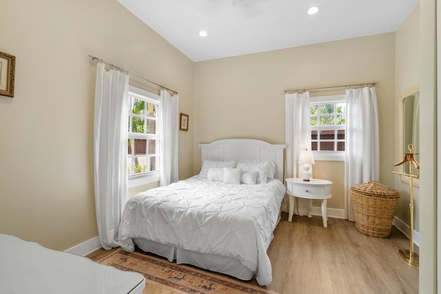 bedroom with light hardwood / wood-style floors