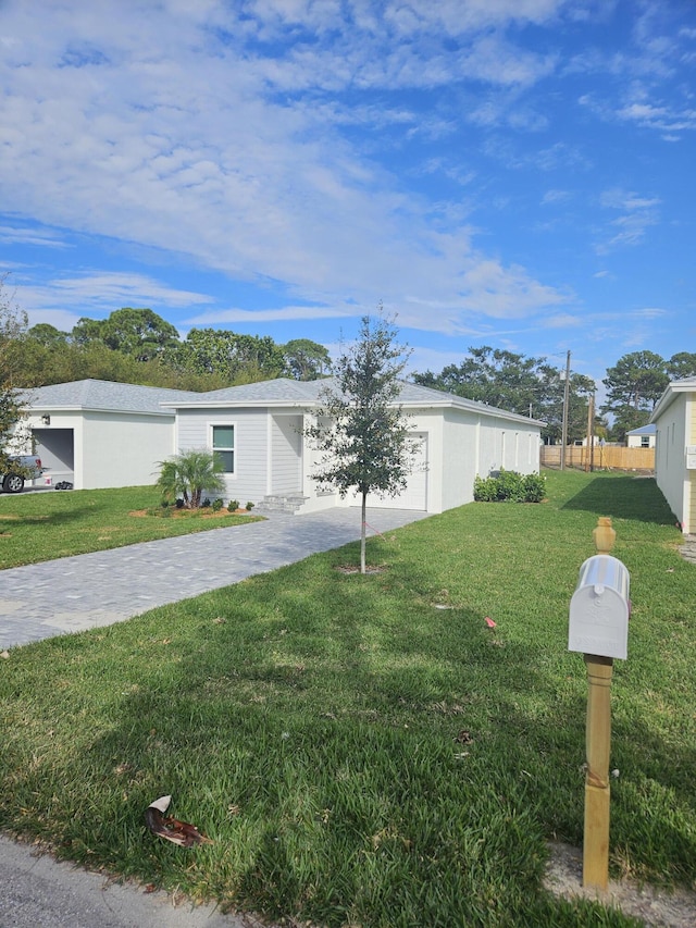 view of front of home with a front yard