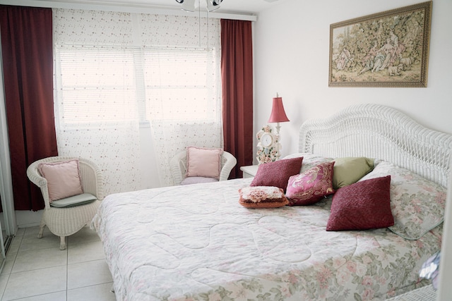 bedroom with light tile patterned flooring