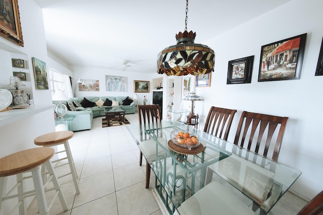 dining room featuring ceiling fan and light tile patterned floors