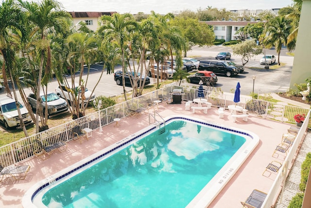 view of swimming pool with a patio area