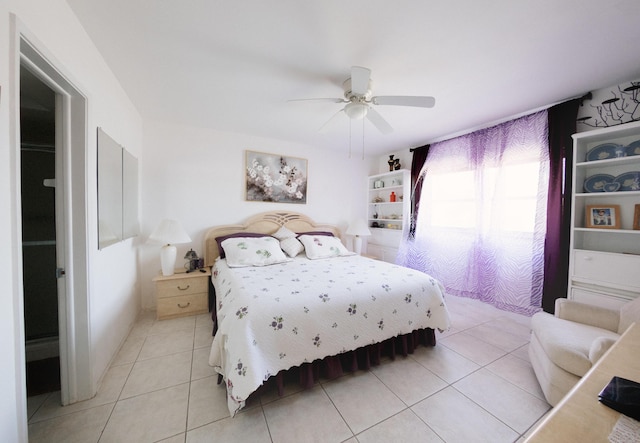 bedroom featuring ceiling fan and light tile patterned floors