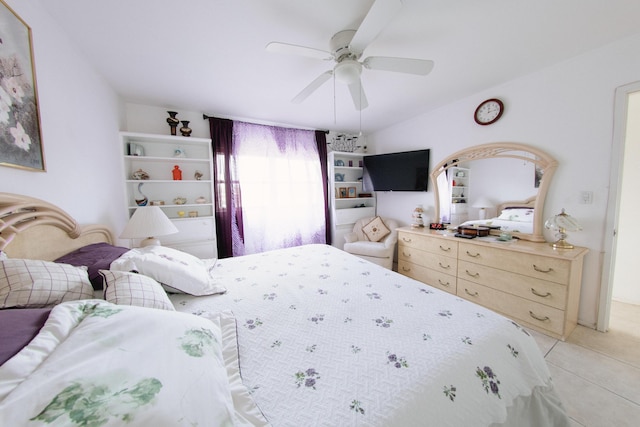 bedroom featuring ceiling fan and light tile patterned floors