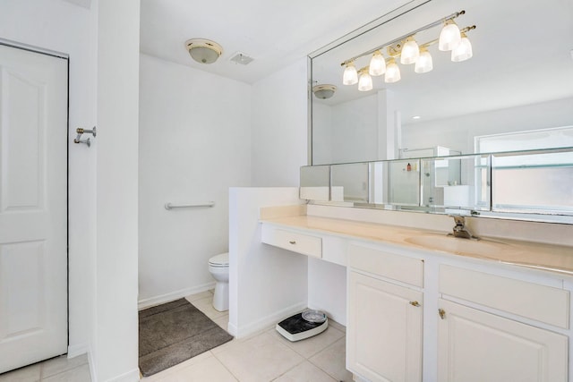 bathroom with toilet, vanity, an enclosed shower, and tile patterned floors