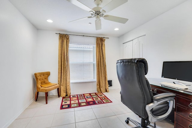 home office with ceiling fan and light tile patterned floors