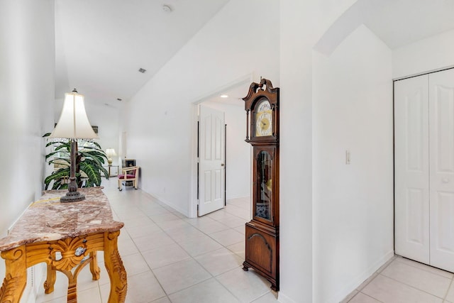 hall with light tile patterned flooring