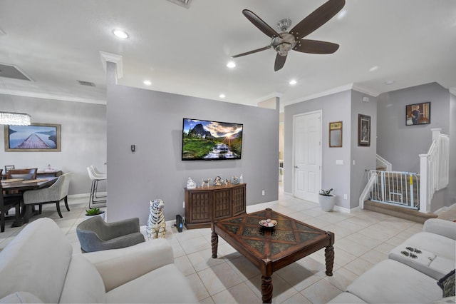 living room featuring ceiling fan, light tile patterned floors, and ornamental molding