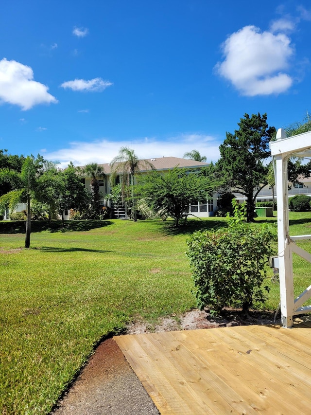 view of yard with a deck