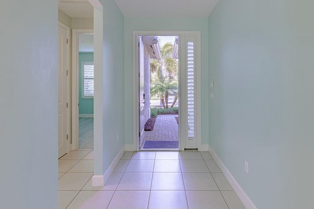 tiled entrance foyer with a wealth of natural light