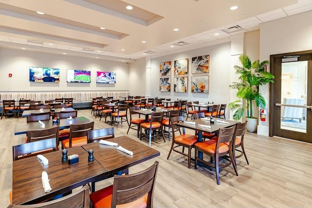 dining area featuring light wood-type flooring, visible vents, and recessed lighting