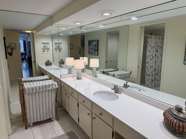 bathroom featuring vanity and tile patterned flooring